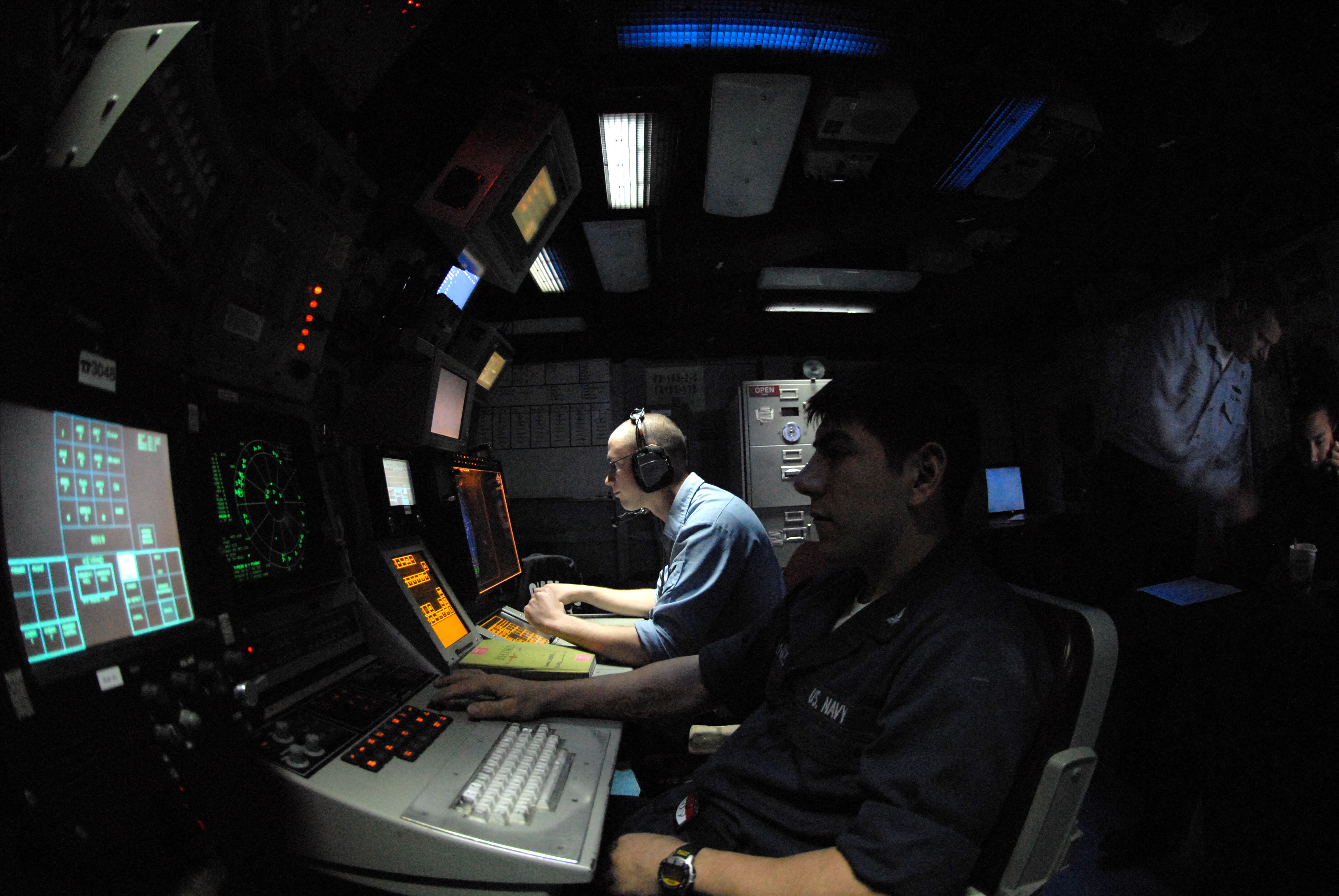 us_navy_060519-n-2959l-004_cryptologic_technicians_monitor_electronic_emissions_in_the_electronic_warfare_module_aboard_the_nimitz-class_aircraft_carrier_uss_ronald_reagan_cvn_76.jpg